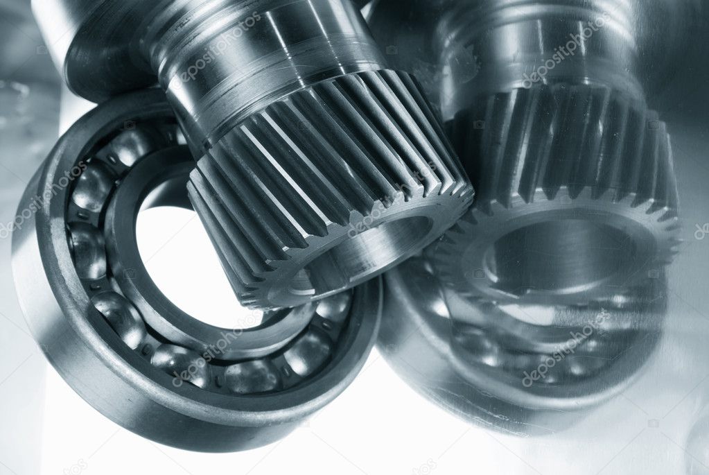 Ball bearings, gears against brushed aluminum