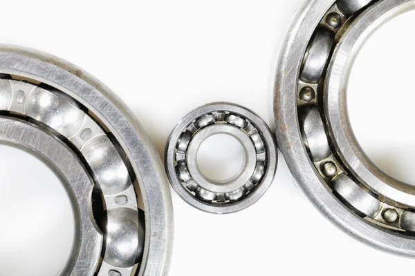 Ball bearings set against white background — Stock Photo, Image