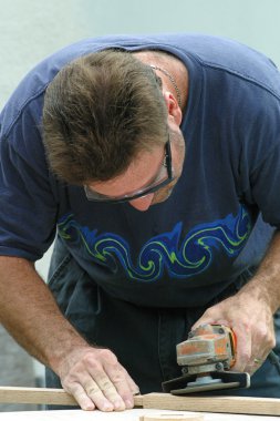 Man Doing Carpentry clipart