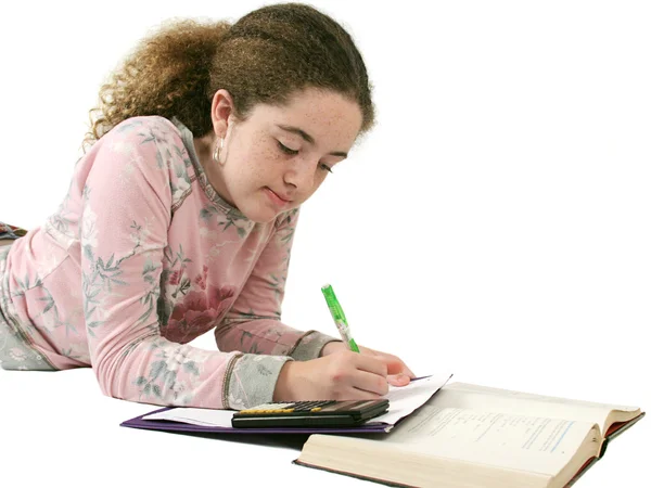 Подросток делает домашнее задание — стоковое фото