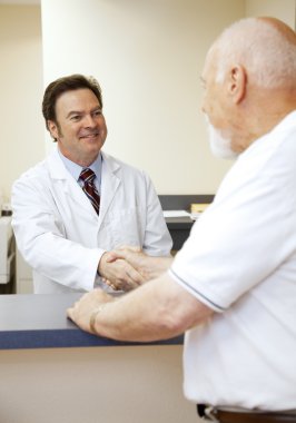 Doctor Greets Patient clipart