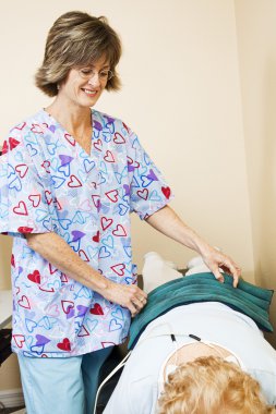 Physical Therapist Helps Patient clipart