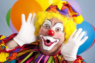 Clown Makes Funny Face clipart