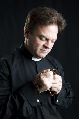 Priest in Prayer clipart