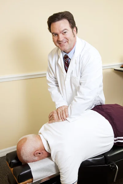 Chiropractor Enjoys His Work — Stock Photo, Image
