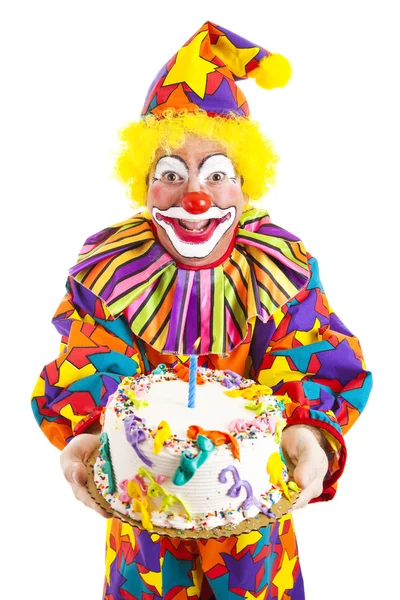 День рождения клоуна с тортом — стоковое фото