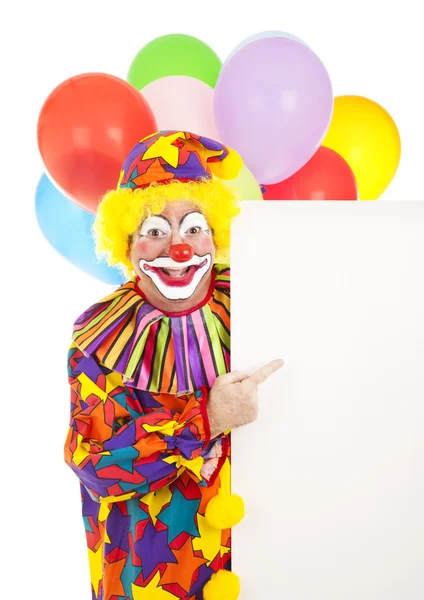 Clown zeigt auf Schild — Stockfoto