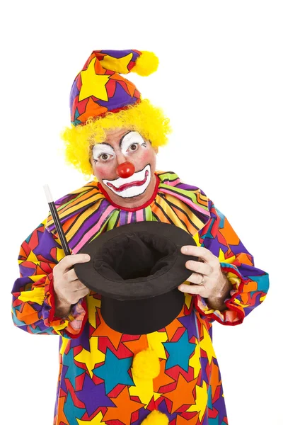 Trauriger Clown mit leerem Hut — Stockfoto