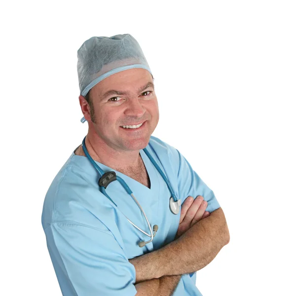 Vänlig läkare i scrubs — Stockfoto