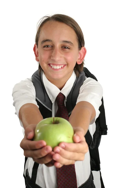 Счастливый школьник с Apple — стоковое фото