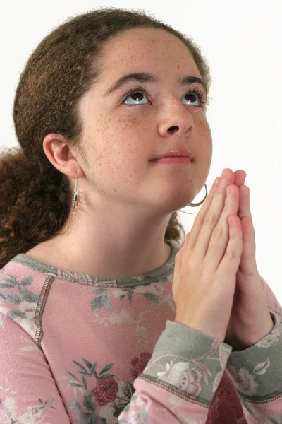 Une jeune fille attrayante priant — Photo