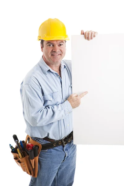 Construction Worker Points to Sign — Stock Photo, Image