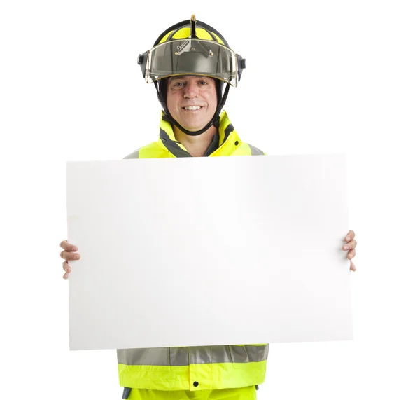 Feuerwehrmann mit leerem Schild — Stockfoto