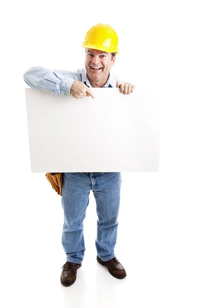 Trabajador lleva signo en blanco —  Fotos de Stock