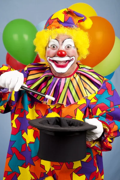 Clown Does Magic Trick Stock Image
