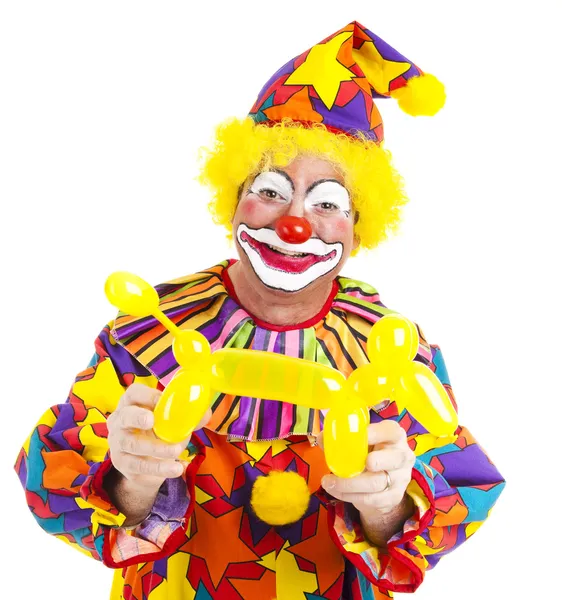 Happy Clown With Balloon Doggie Royalty Free Stock Photos