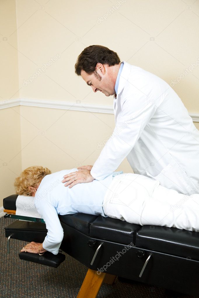 Chiropractor Manipulating Spine