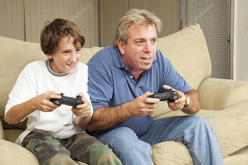 Chinese Girlfriend And Boyfriend Playing Videogame Using Games Console  Sitting On Floor At Home. Computer Gaming And Videogames For Couple, Family  Weekend Leisure Concept Stock Photo, Picture and Royalty Free Image. Image