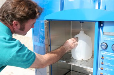 Hurrican Preparedness - Filling Water Bottle clipart