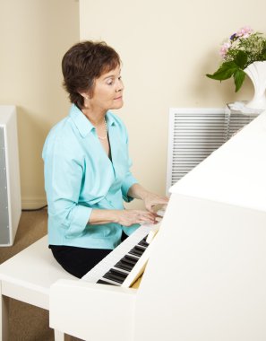 Pianist Playing Church Hymns clipart