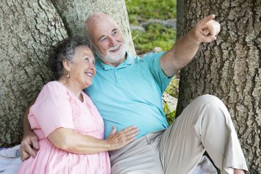 Seniors Bird-Watching in the Park clipart