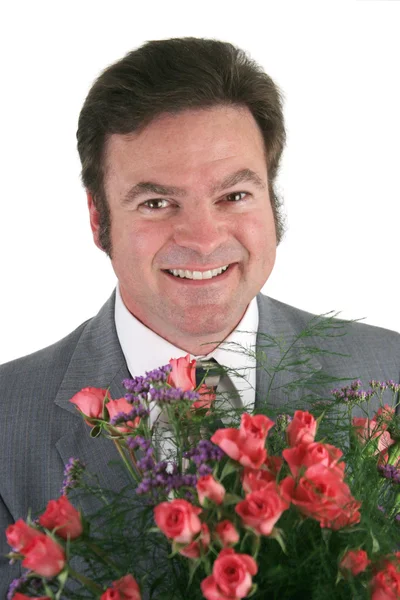 Affärsman med rosor närbild — Stockfoto