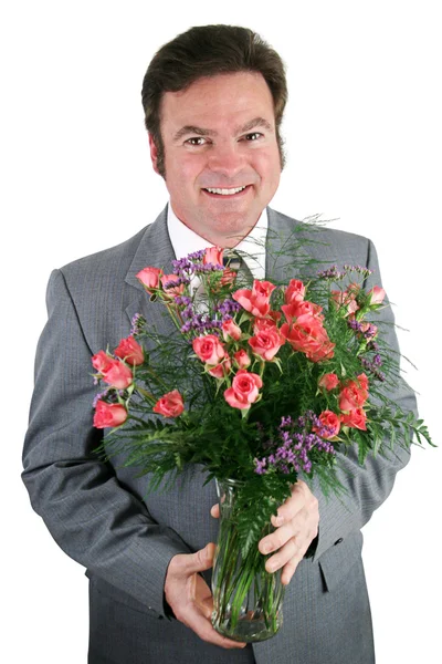 Uomo d'affari con rose — Foto Stock