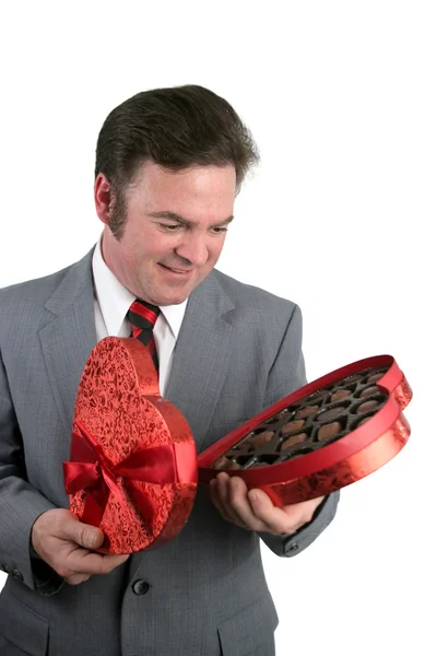 キャンディに驚いてバレンタイン男 — ストック写真