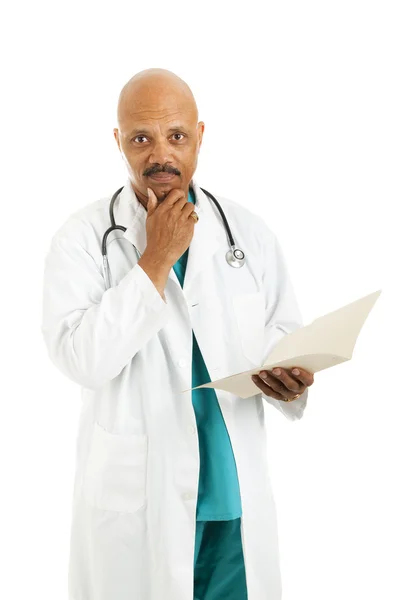Serious Doctor Considers Options — Stock Photo, Image