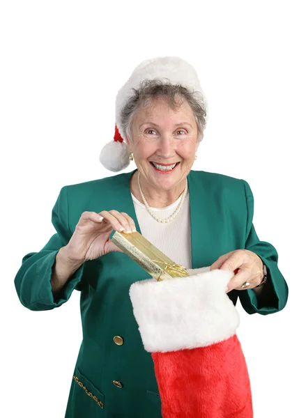 Пенсионеры с рождественскими чулками — стоковое фото