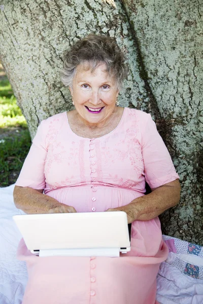 Senior Woman on Wireless Network — Stock Photo, Image