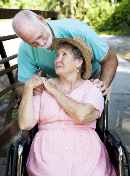 Senior Couple Caretaker Stock Image