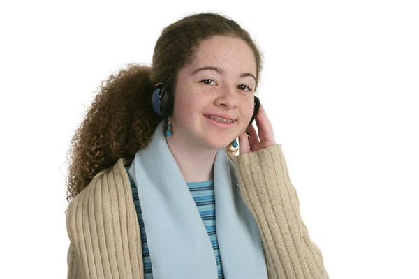 Adolescente bonito com fones de ouvido — Fotografia de Stock