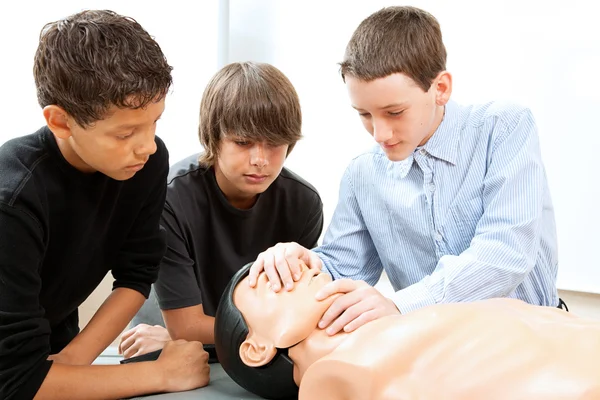 Boys Practicing CPR — 图库照片