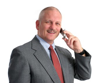 Happy Businessman On Cell Phone clipart