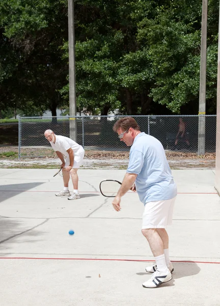 Familie racquetball spel — Stockfoto
