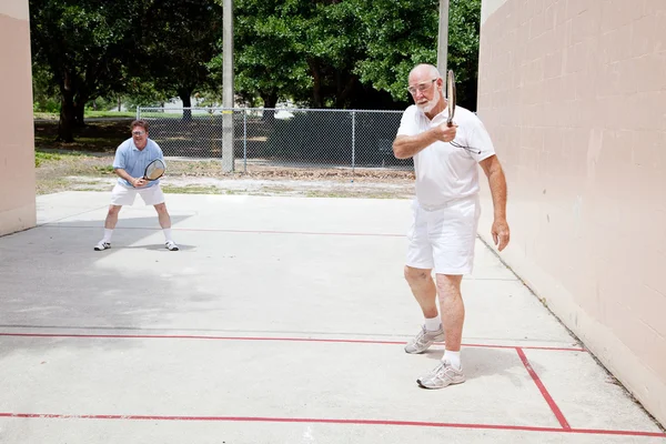Baba oğul raquetball — Stok fotoğraf