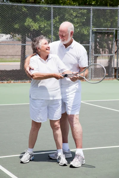 Lekcja tenisa - starszy kobieta — Zdjęcie stockowe