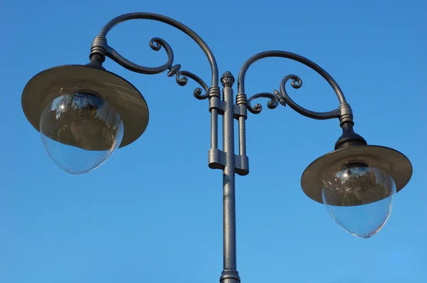 stock image Streetlight isolated on blue sky