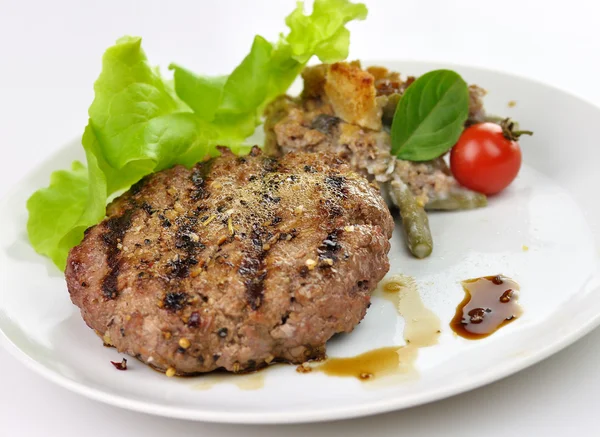 Juicy grilled hamburger — Stock Photo, Image