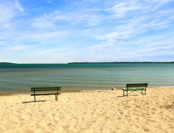 Empty beach with benches — Stock Photo, Image
