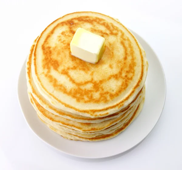 Golden pancakes with butter — Stock Photo, Image