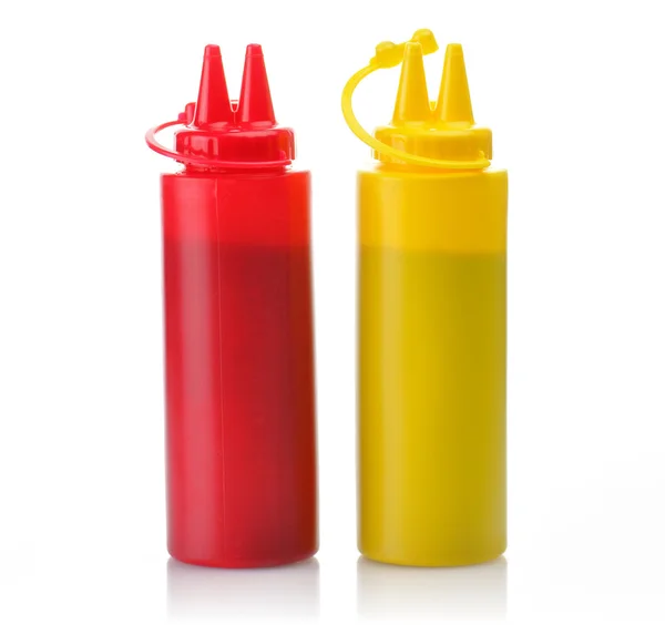 Flessen van ketchup en mosterd. — Stockfoto