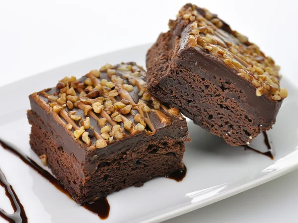 stock image Brownies with chocolate sauce