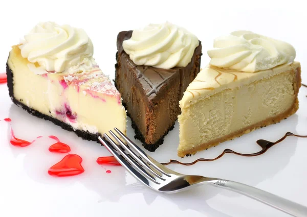 Slices of cheesecakes — Stock Photo, Image