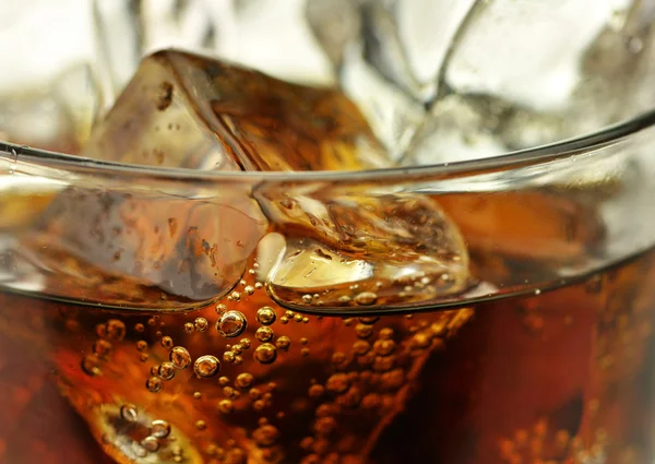 stock image Cola with ice cubes close up