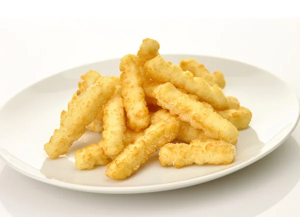 Pommes de terre frites dans une assiette blanche — Photo