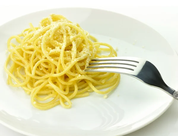 Spaghetti med gaffel - Stock-foto