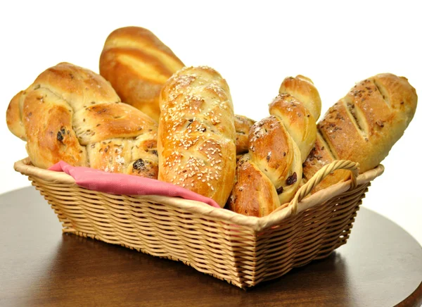 Bread assortment in a basket — Stock Photo, Image