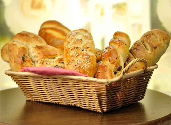 Bread assortment in a basket — Stock Photo, Image